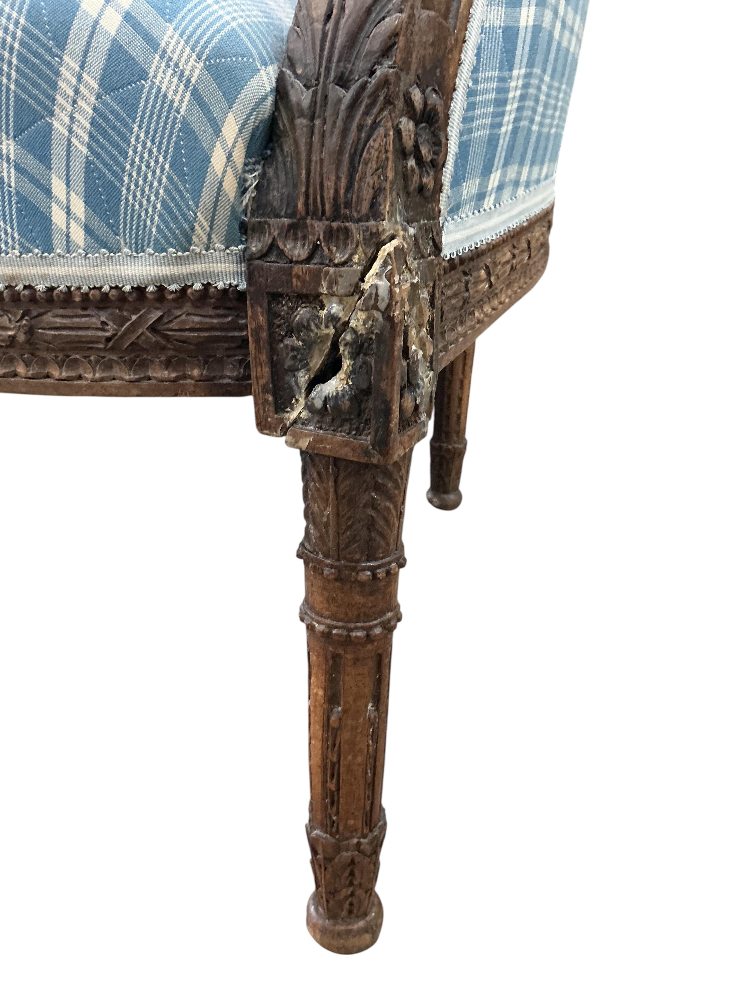 A late 19th century French upholstered settee, width 126cm, depth 60cm, height 94cm, Provenance: The late Kenneth Turner (1936-2025), celebrity florist, designer and perfume retailer, he received the Royal Warrant from t